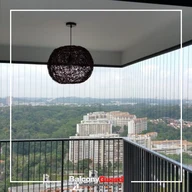 Invisible wire grill installed on condo balcony