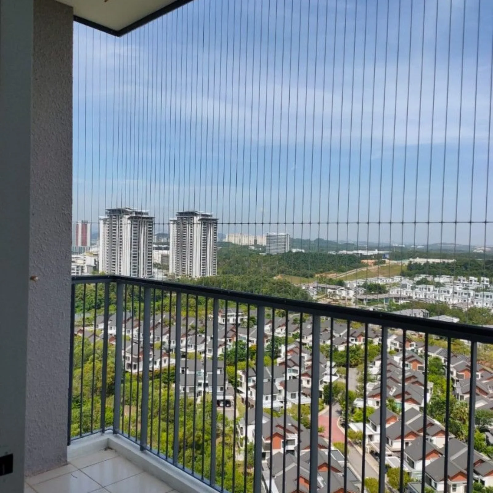 Invisible safety grill protecting balcony without blocking view