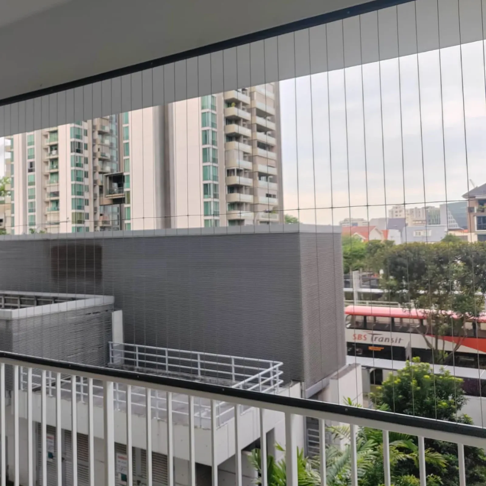 Invisible grille Penang condo balcony installation